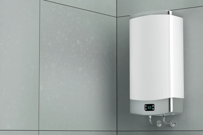 modern white tankless water heater unit mounted on wall